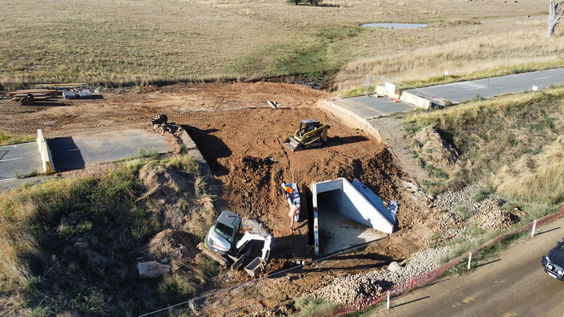 Reconstruction of Gooramadda Road showing new culvers installed and backfilling around them almost complete