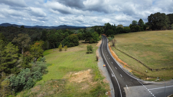 Drone photo showing newly painted and sealed road in rural setting