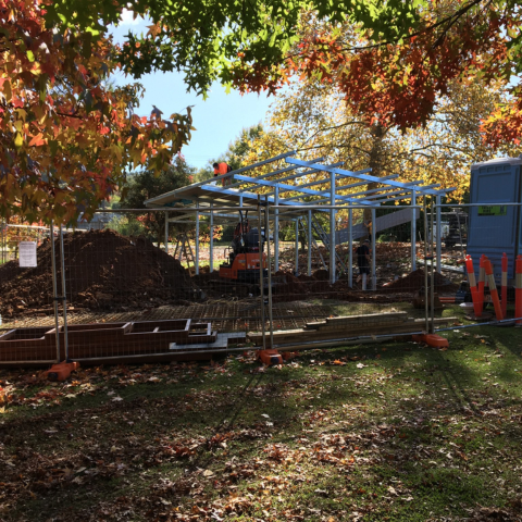 Construction site of new toilet facility showing new steel frame in a park setting